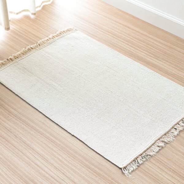 White woven carpet background on the floor